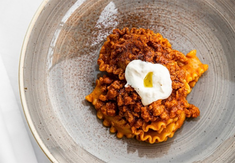 a close up of a bowl of pasta at otto restaurant
