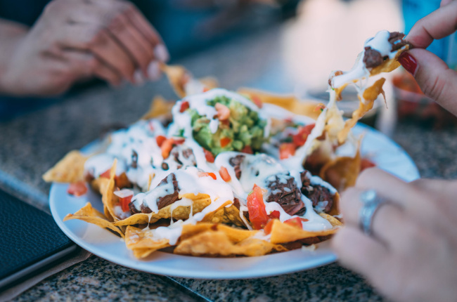 a plate of tasty nachos