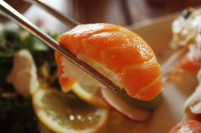 a close up shot of fresh sashimi sushi