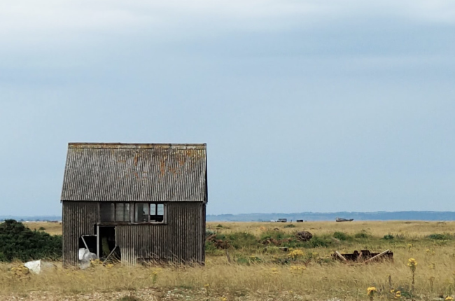 an abandoned tin shack out in the middle of nowhere
