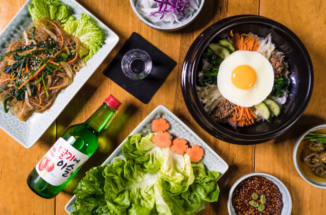 a table filled with Korean food