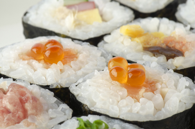 a close up shot of fish roe sushi