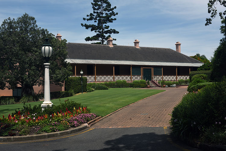 a landscape photo of a house sitting on newstead park
