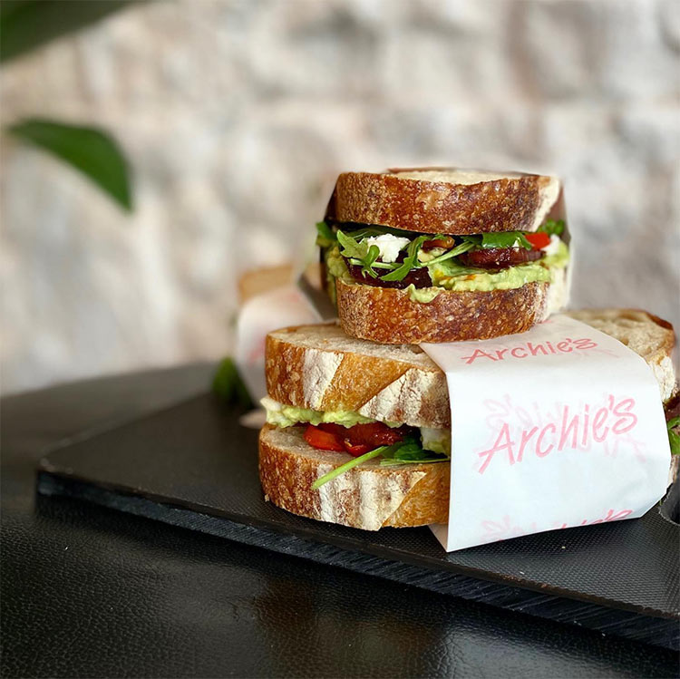 two fresh sandwhiches stacked together at archies restaurants in melbourne