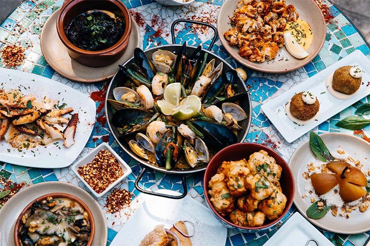 a table filled with spanish food